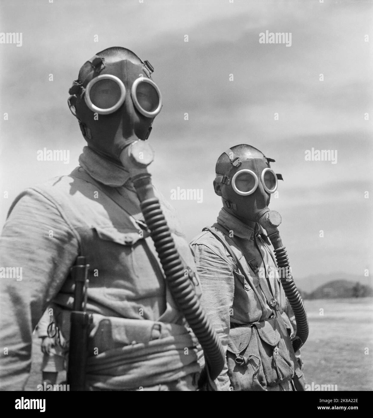 Cecil Beaton - Two Chinese soldiers wearing gas masks at Pihu Military Training Centre in south eastern China - 1944 Stock Photo