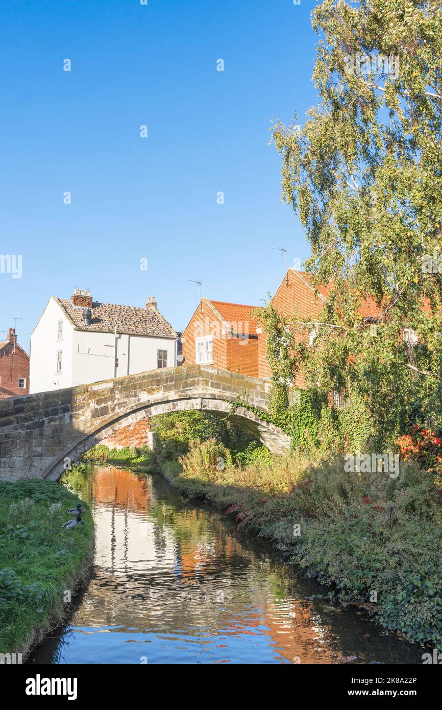 The listed Packhorse Bridge over the river Leven in Stokesley, North Yorkshire, England, UK Stock Photo