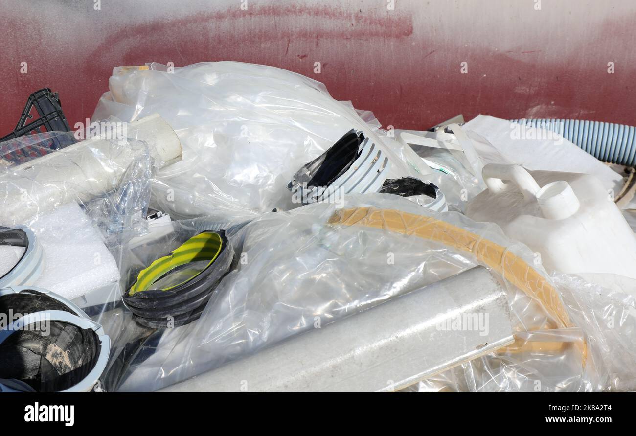 containers with pieces of used and broken plastic for separate