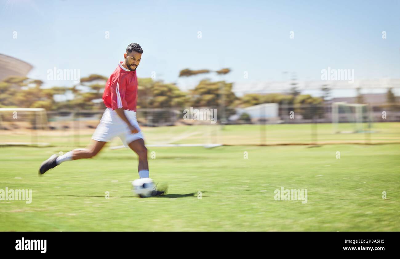 Football, running and soccer man with a ball doing a sport exercise
