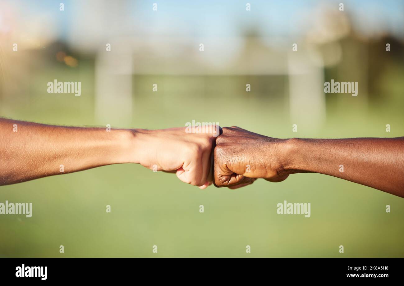Fist bump, closeup and diversity meeting, team support and partnership outdoors. Hands of friends greeting with thank you, solidarity motivation or Stock Photo
