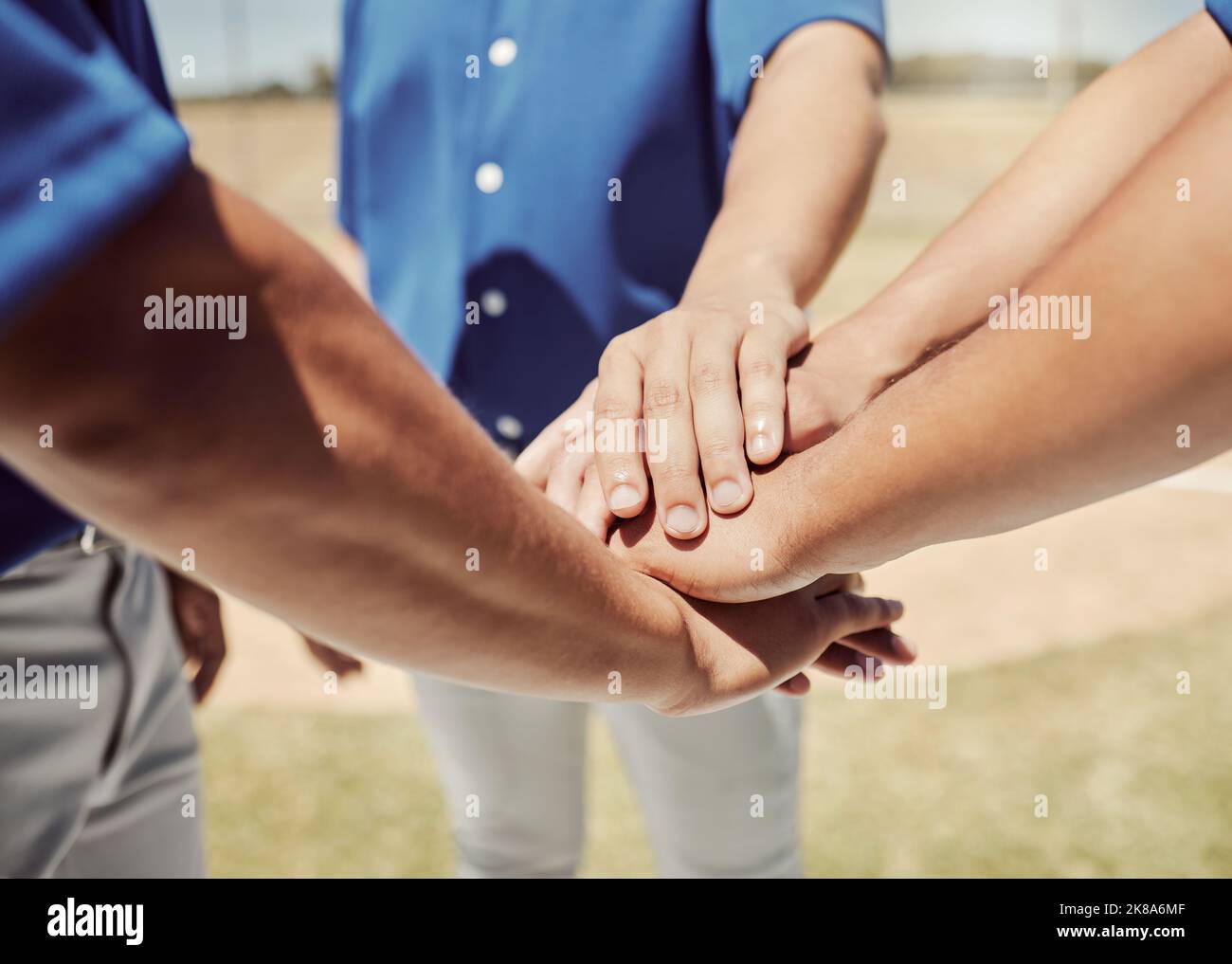 Teamwork, support and hands of baseball player for motivation in sports, goals and winner mindset. Training, community and mission with athlete in Stock Photo