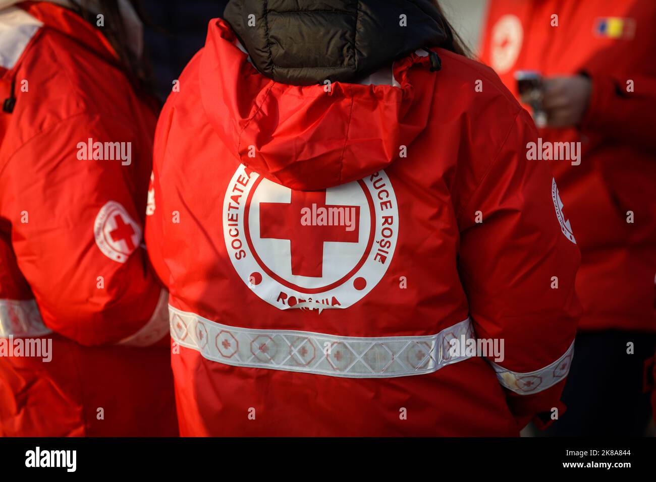 Isaccea, Romania - March 3, 2022: Details with the jacket of a Romanian Red Cross volunteer. Stock Photo