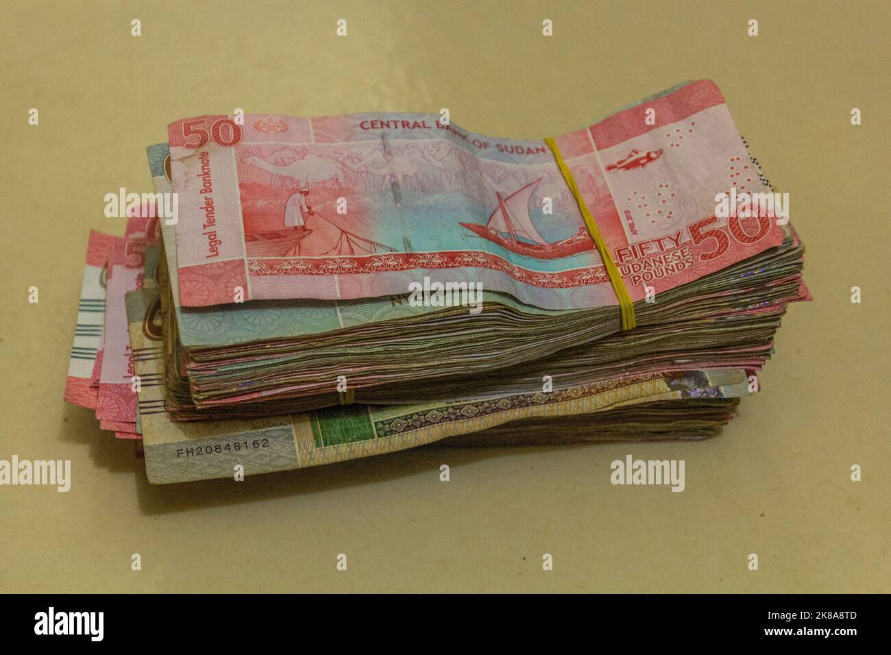 Stacks of Sudanese Pound banknotes Stock Photo