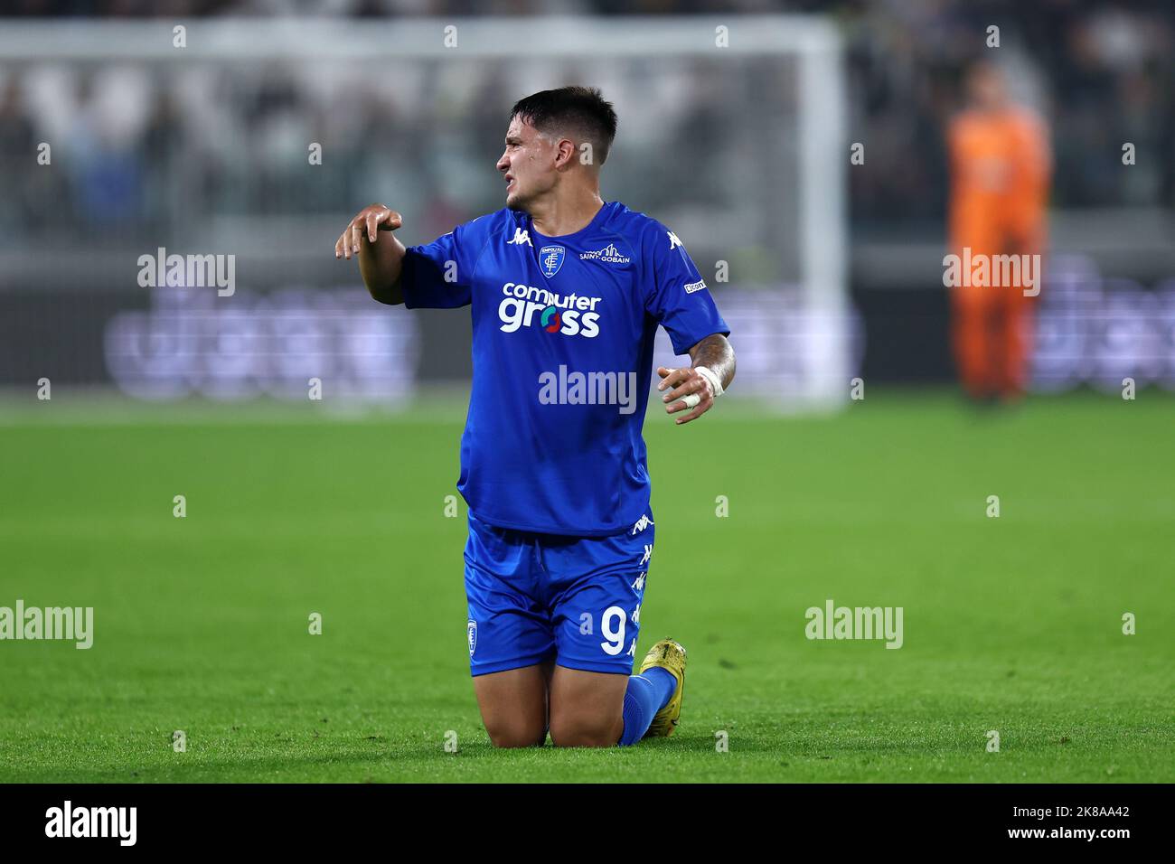 Turin, Italy. 21st Oct 2022. Martin Satriano of Empoli Fc lies on the ground during the  Serie A match beetween Juventus Fc and Empoli Fc at Allianz Stadium on October 21, 2022 in Turin, Italy . Credit: Marco Canoniero/Alamy Live News Stock Photo