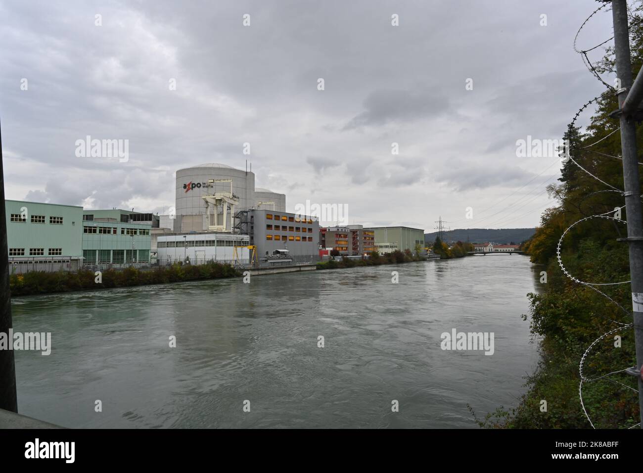 View on a nuclear power plant Beznau, owned by Axpo, from the bridge over river Aare. Stock Photo