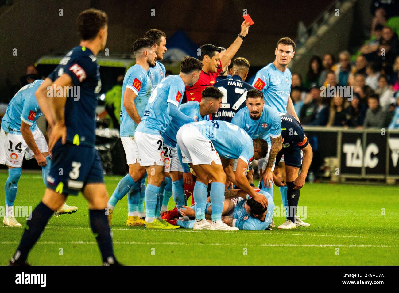 Melbourne, Australia. 22, October, 2022. Match Official Alireza Faghani presents Melbourne Victory Captain Josh Brilliant with a red card after getting a second yellow during the Round 3 of Isuzu UTE A-League Men’s 2022/23 season between Melbourne Victory and Melbourne City.  Credit: James Forrester/Alamy Live News. Stock Photo