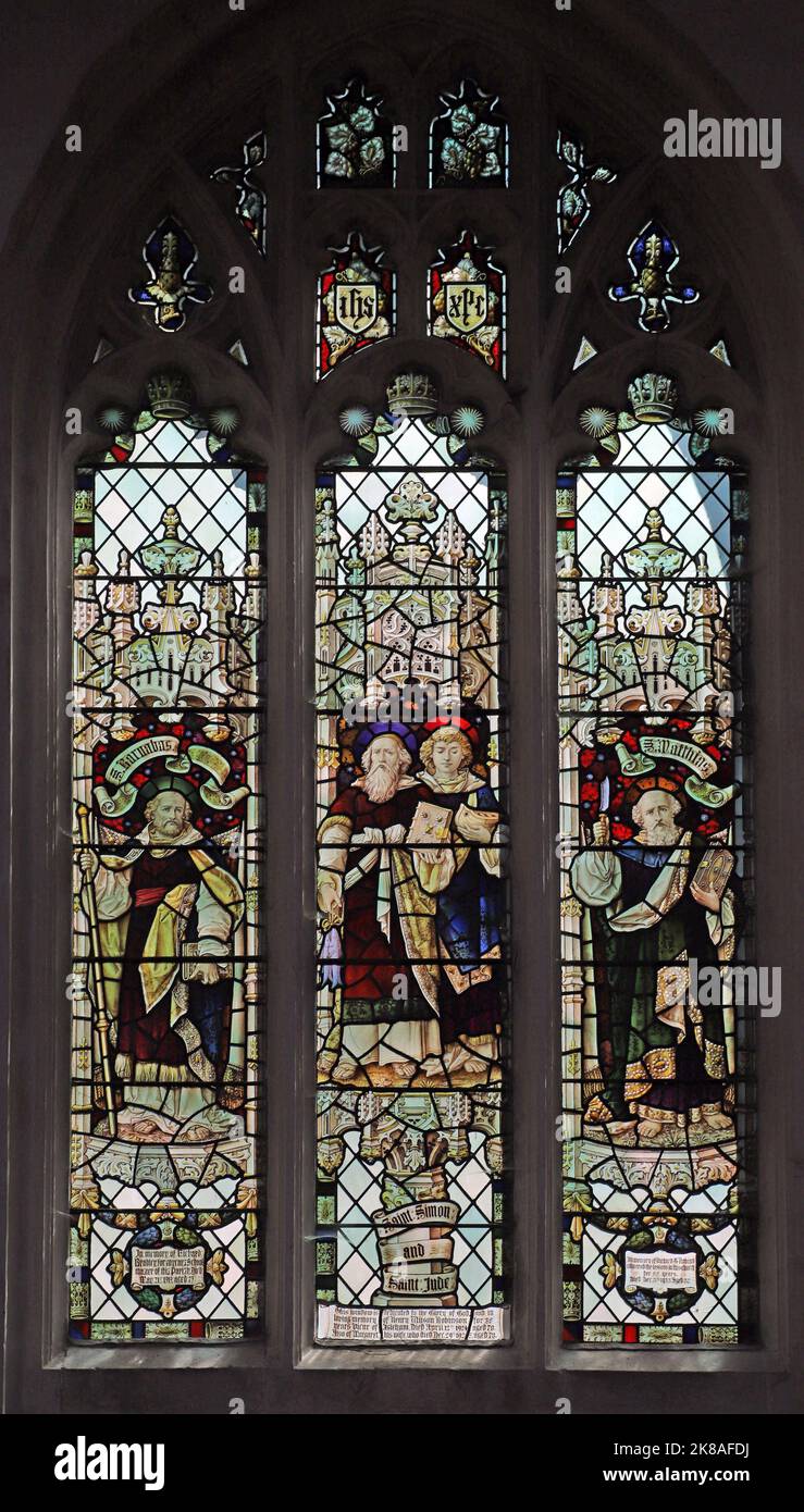 Stained glass window by Percy Bacon & Brothers depicting Saints Barnabas, Simon, Jude & Mattias, St Andrew's Church, Isleham, Cambridgeshire Stock Photo