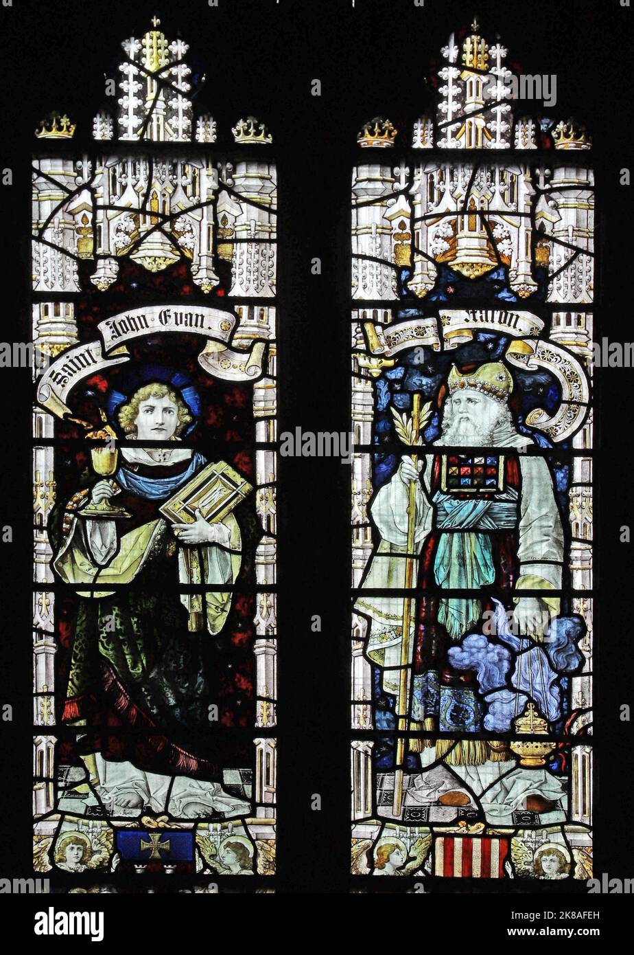 Stained glass window by Percy Bacon & Brothers depicting St John the Evangelist & the Prophet Aaron, St Chad's Church, Bensham, Gateshead Stock Photo