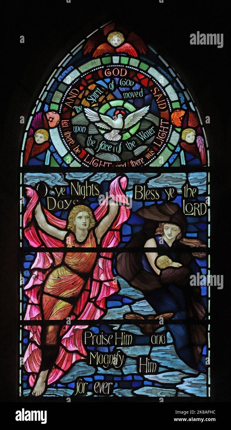 A stained glass window on the theme of the Benedicite, omnia opera Domini (A Song of Creation) by Henry Holiday, Holy Trinity, Casterton near Kirkby L Stock Photo