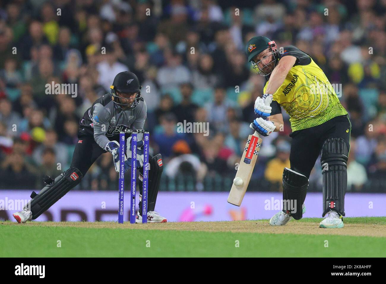 Sydney, Australia. 22nd Oct, 2022. Aaron Finch of Australia hits the ball but is caught out by Kane Richardson of New Zealand during the ICC Mens T20 World Cup 2022 match between New Zealand and Australia at Sydney Cricket Ground, Sydney, Australia on 22 October 2022. Photo by Peter Dovgan. Editorial use only, license required for commercial use. No use in betting, games or a single club/league/player publications. Credit: UK Sports Pics Ltd/Alamy Live News Stock Photo