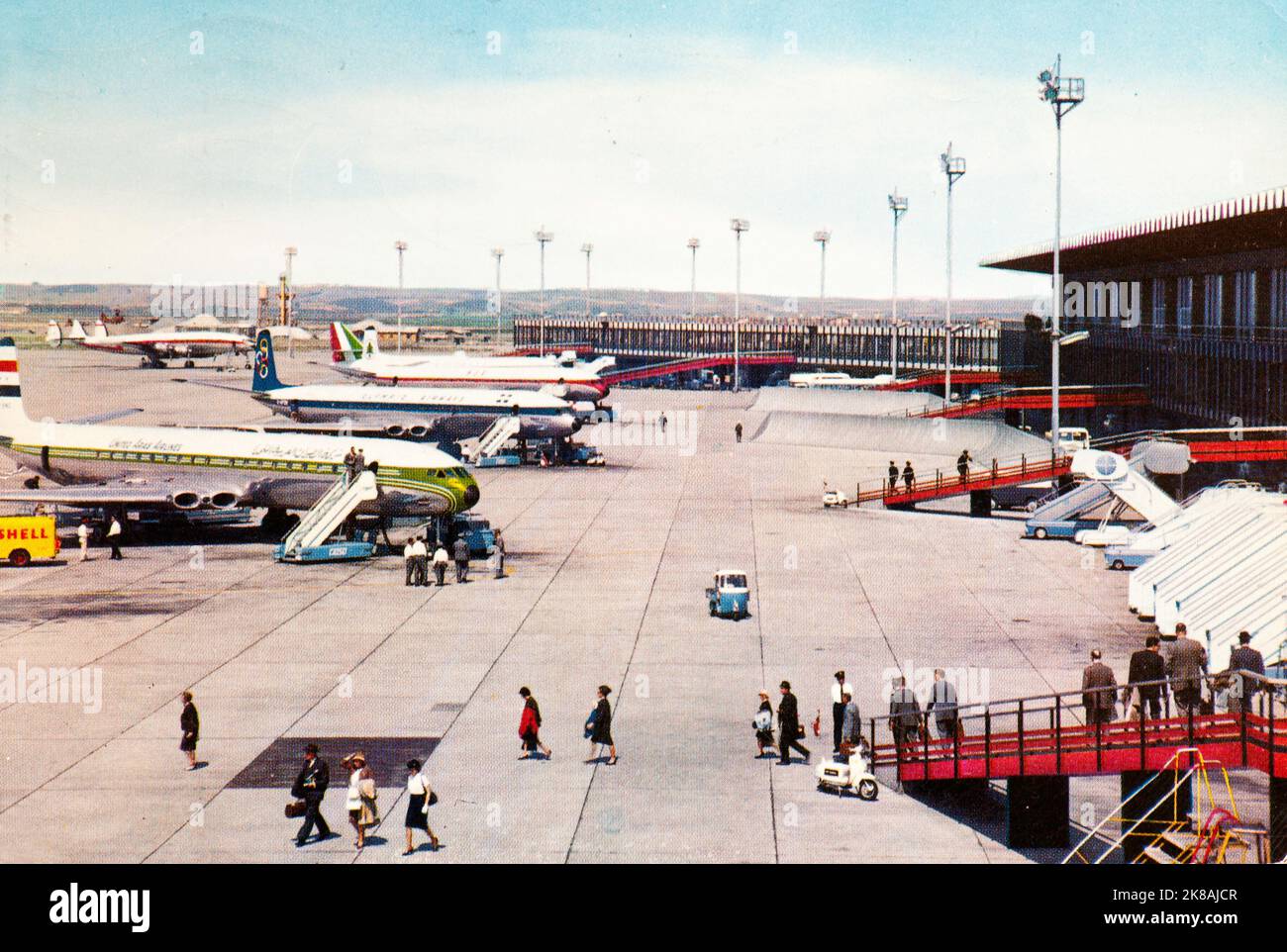 Airplanes at gate at Fiumicino airport in Rome. It is possible to see several Comets and a Constellation. The image dates back to the second half of the sixties Stock Photo