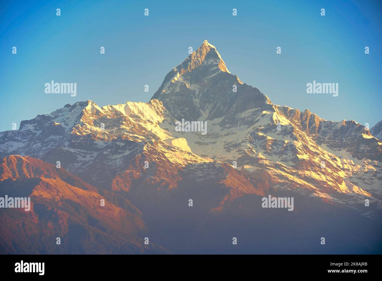 Isolated Fishtail Mountain Peak or the sacred Machey Pucharey in Nepal Stock Photo
