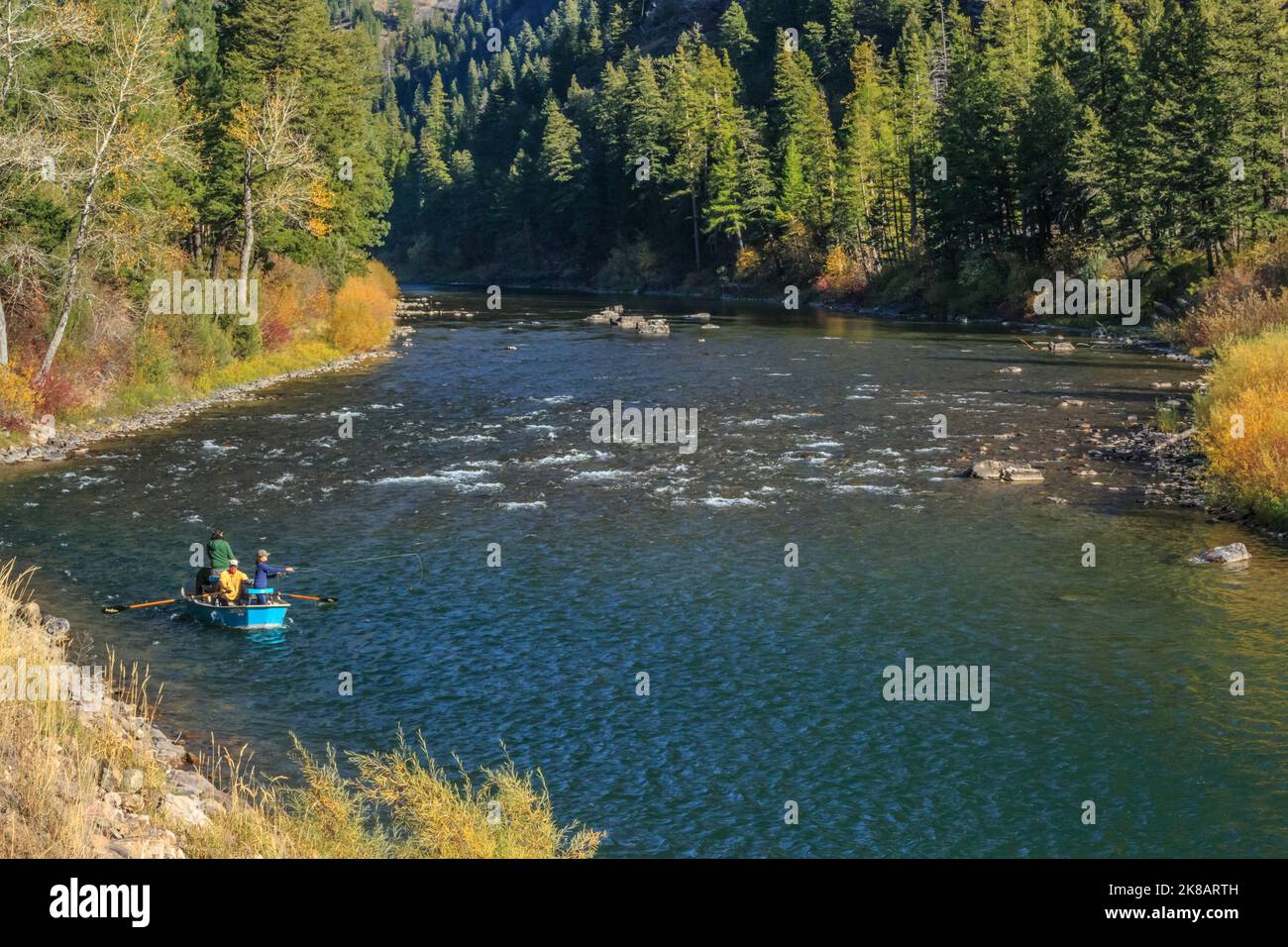 boaters flishing on the blackfoot river in autumn near bonner, montana Stock Photo