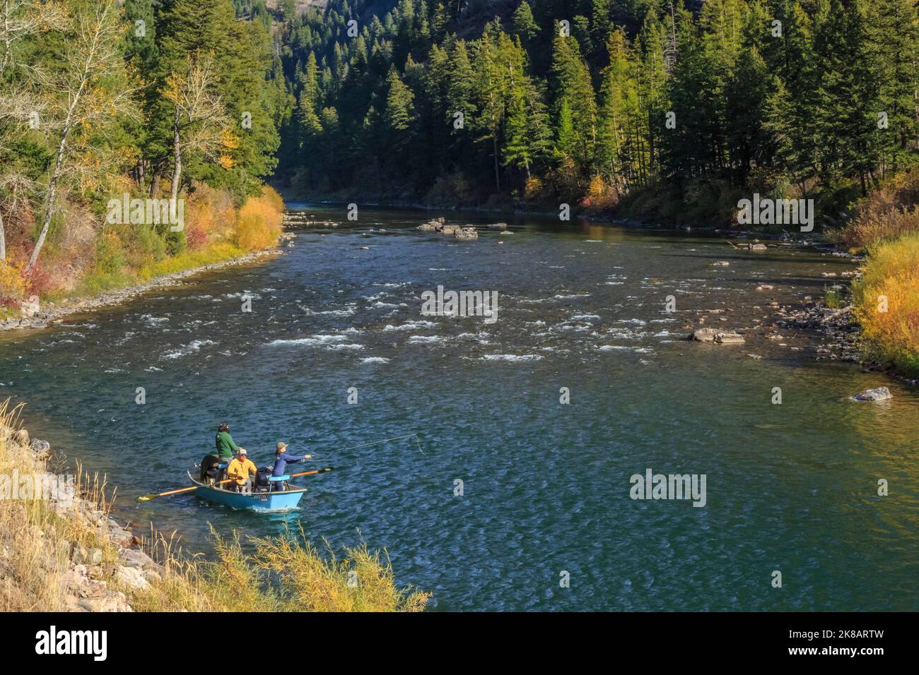 boaters flishing on the blackfoot river in autumn near bonner, montana Stock Photo