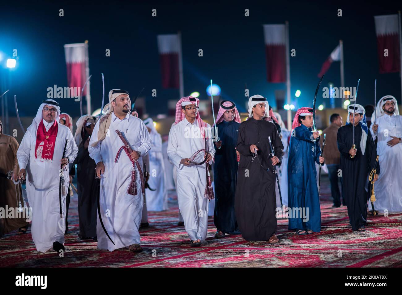 Doha,Qatar,December-18,2017: The sword dance called the 'ardha' at the Darb Al Saai grounds, organized to celebrate Qatar National Day. Stock Photo