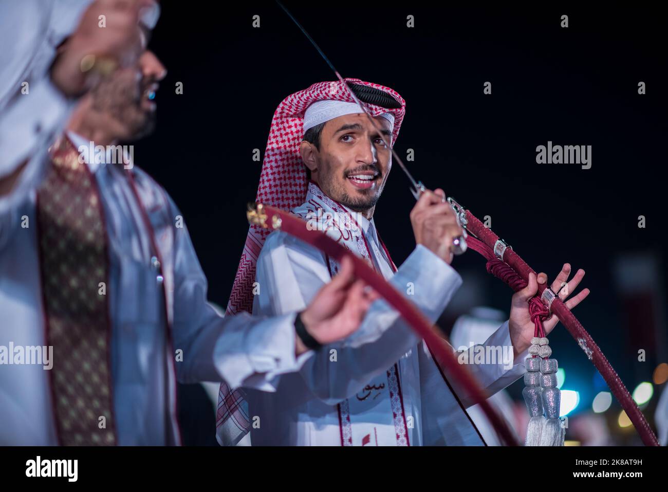 Doha,Qatar,December-18,2017: The sword dance called the 'ardha' at the Darb Al Saai grounds, organized to celebrate Qatar National Day. Stock Photo