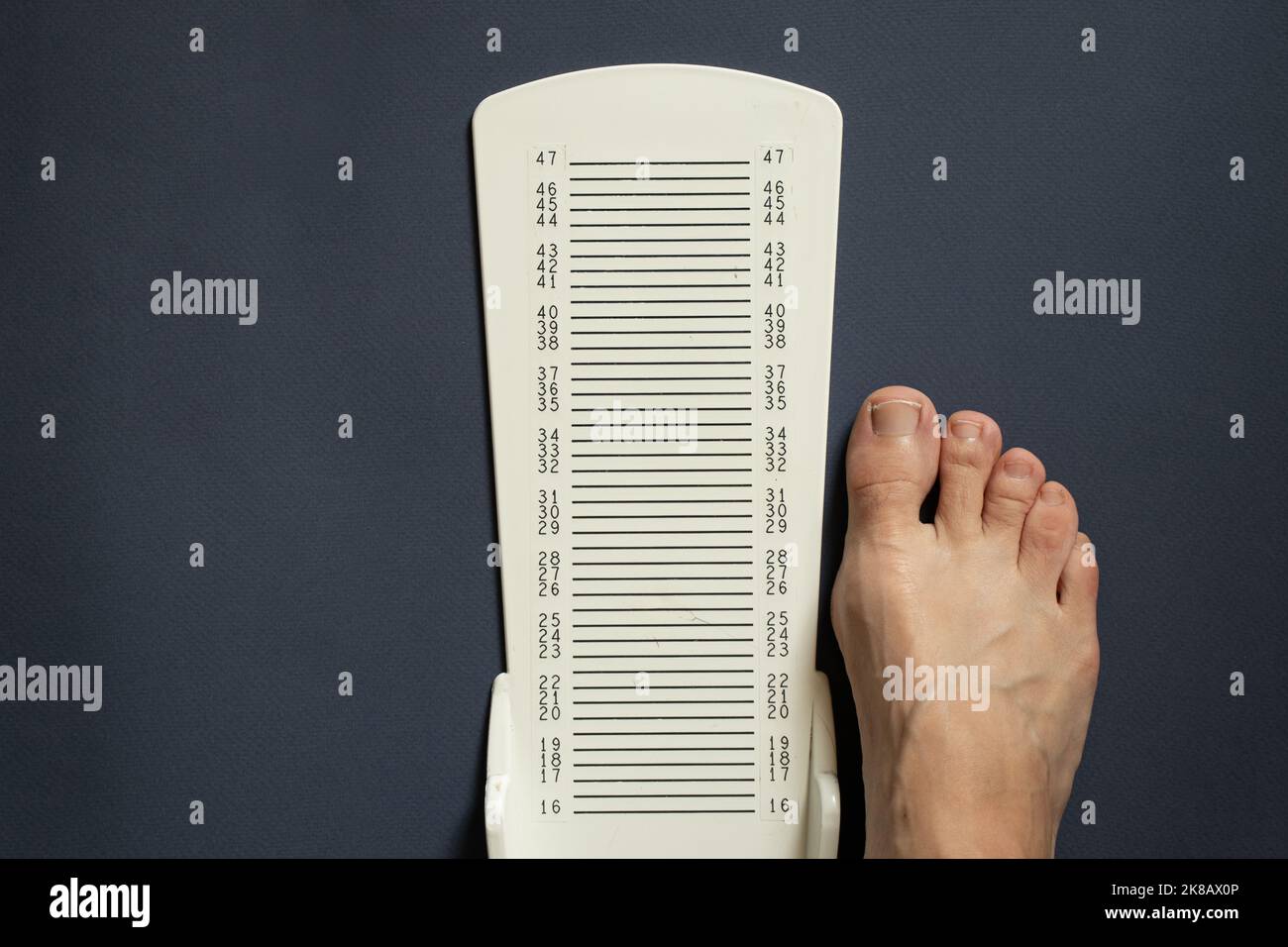 stopwatch for measuring leg length on an isolated background, plastic leg length meter Stock Photo