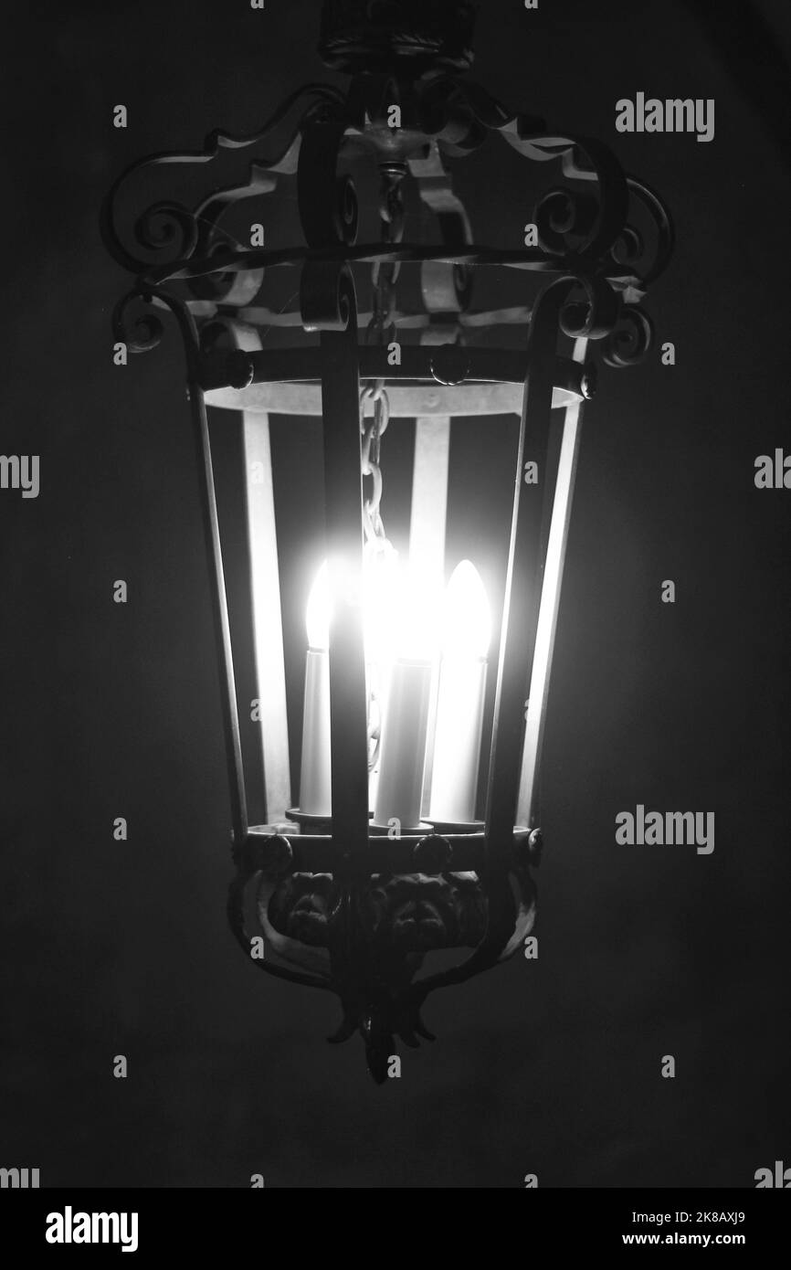 Beautiful vintage hallway light glowing in the evening darkness in a