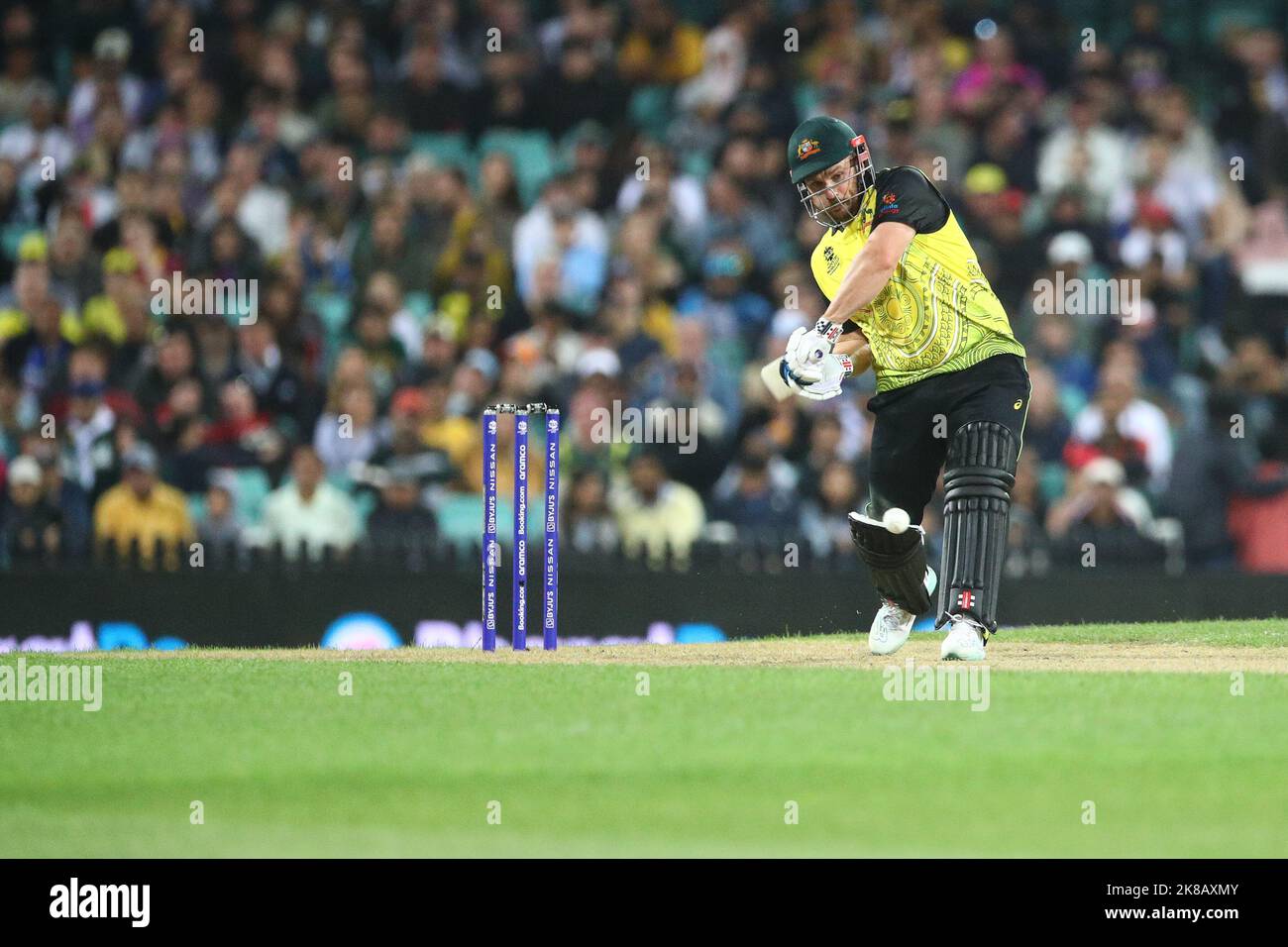 22nd October 2022; SCG, NSW, Australia: T20 World Cup Cricket, Australia versus New Zealand: Aaron Finch of Australia walks down the wicket after hitting the ball over the covers Credit: Action Plus Sports Images/Alamy Live News Stock Photo