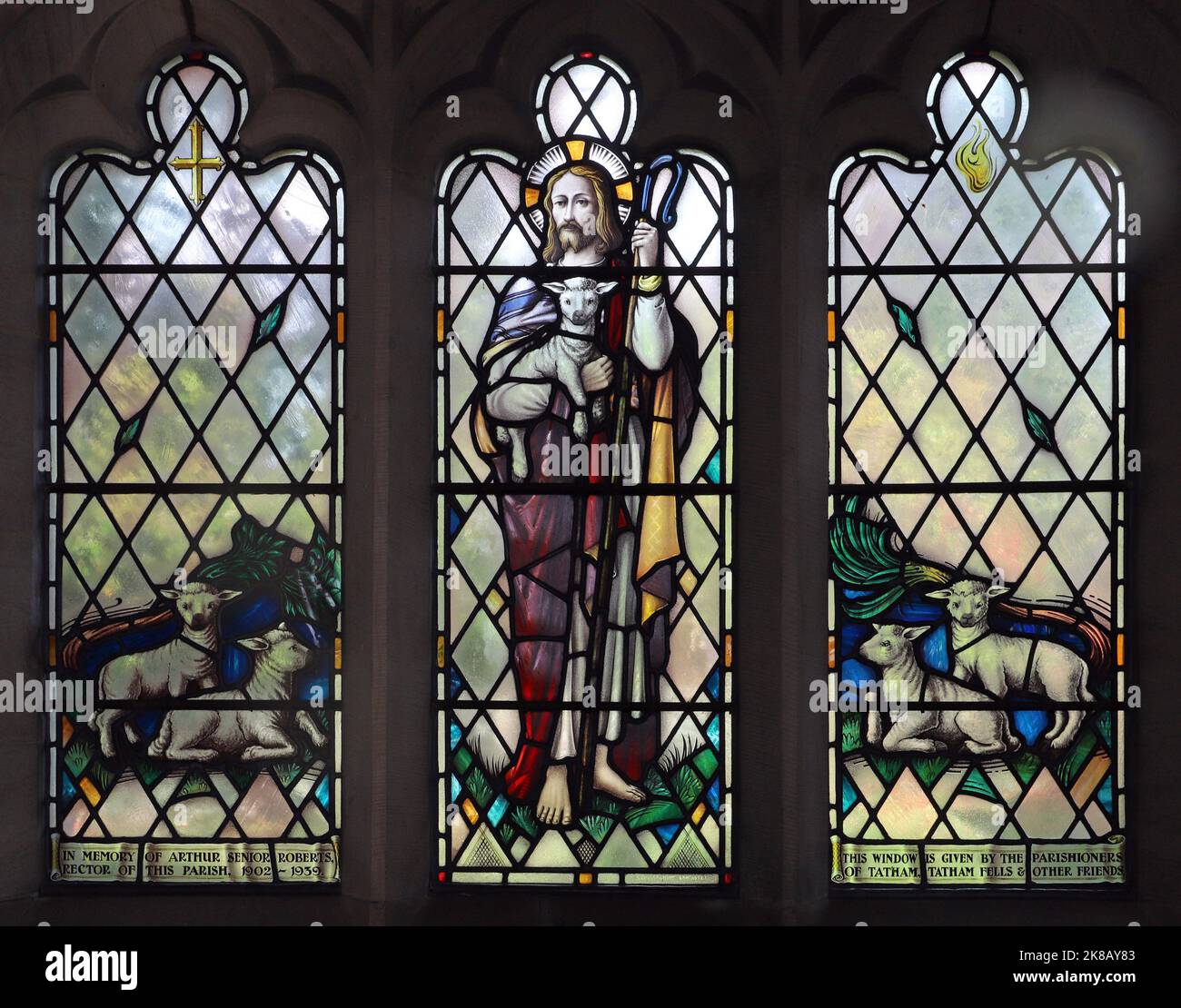 A stained glass window by Shrigley & Hunt of Lancaster depicting Jesus