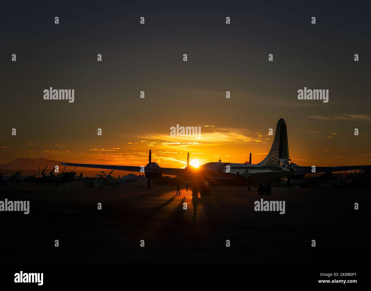 The sun rises on Doc, at B-29 Superfortress, on display at the 2022 Miramar Airshow in San Diego, CA. Stock Photo