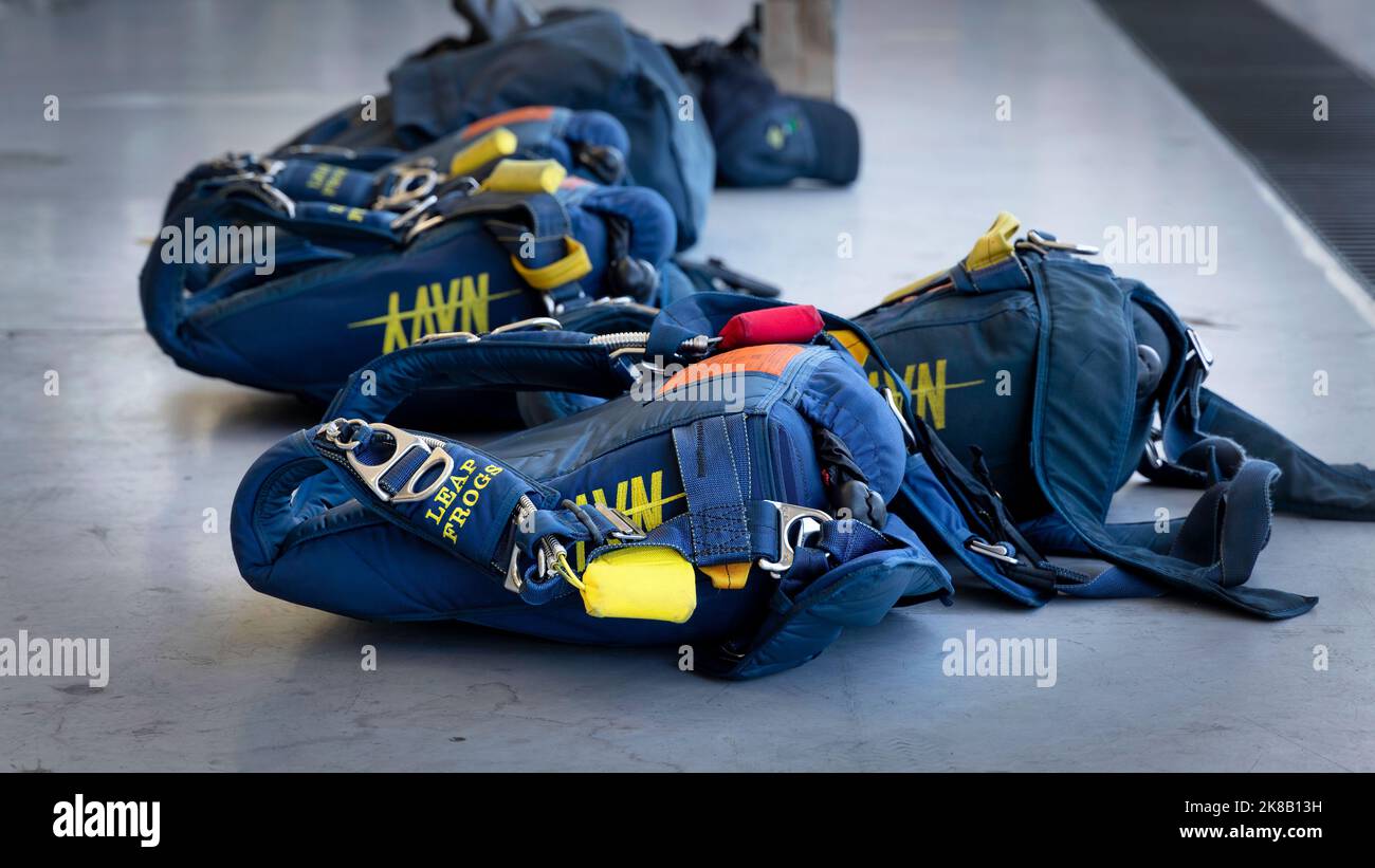 The US Navy Leap Frog parachutes sit on the floor in a hanger before they board their flight to jump at the 2022 Miramar Airshow in San Diego, Califor Stock Photo