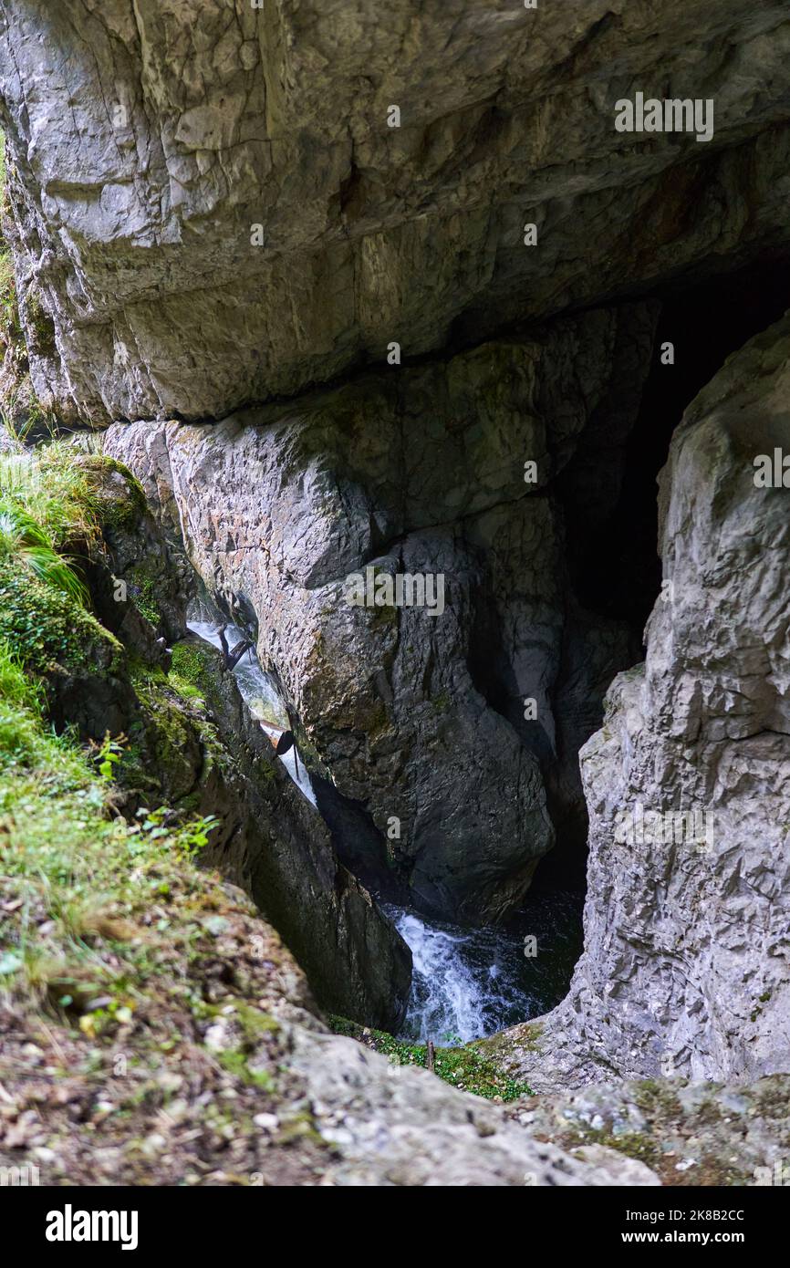 Waterfall in a cave, in a karst system in limestone mountains Stock ...