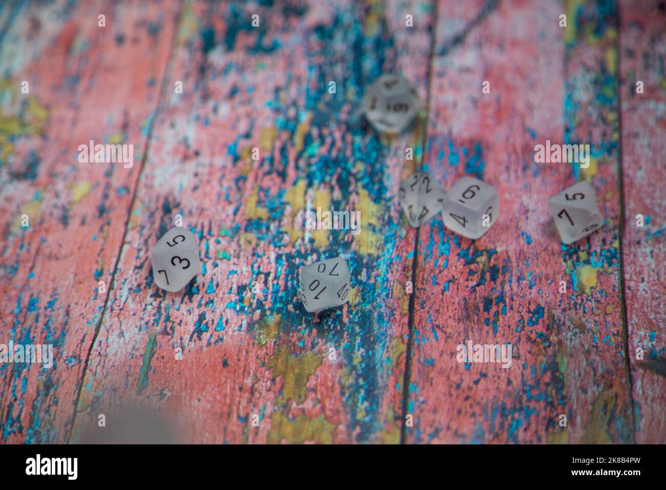 Dice On Colourfull Background Stock Photo