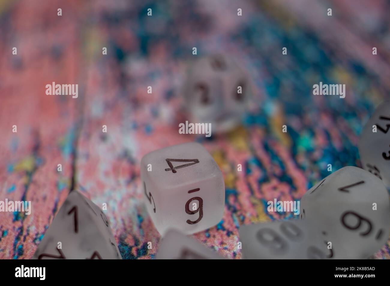 Dice On Colourfull Background Stock Photo