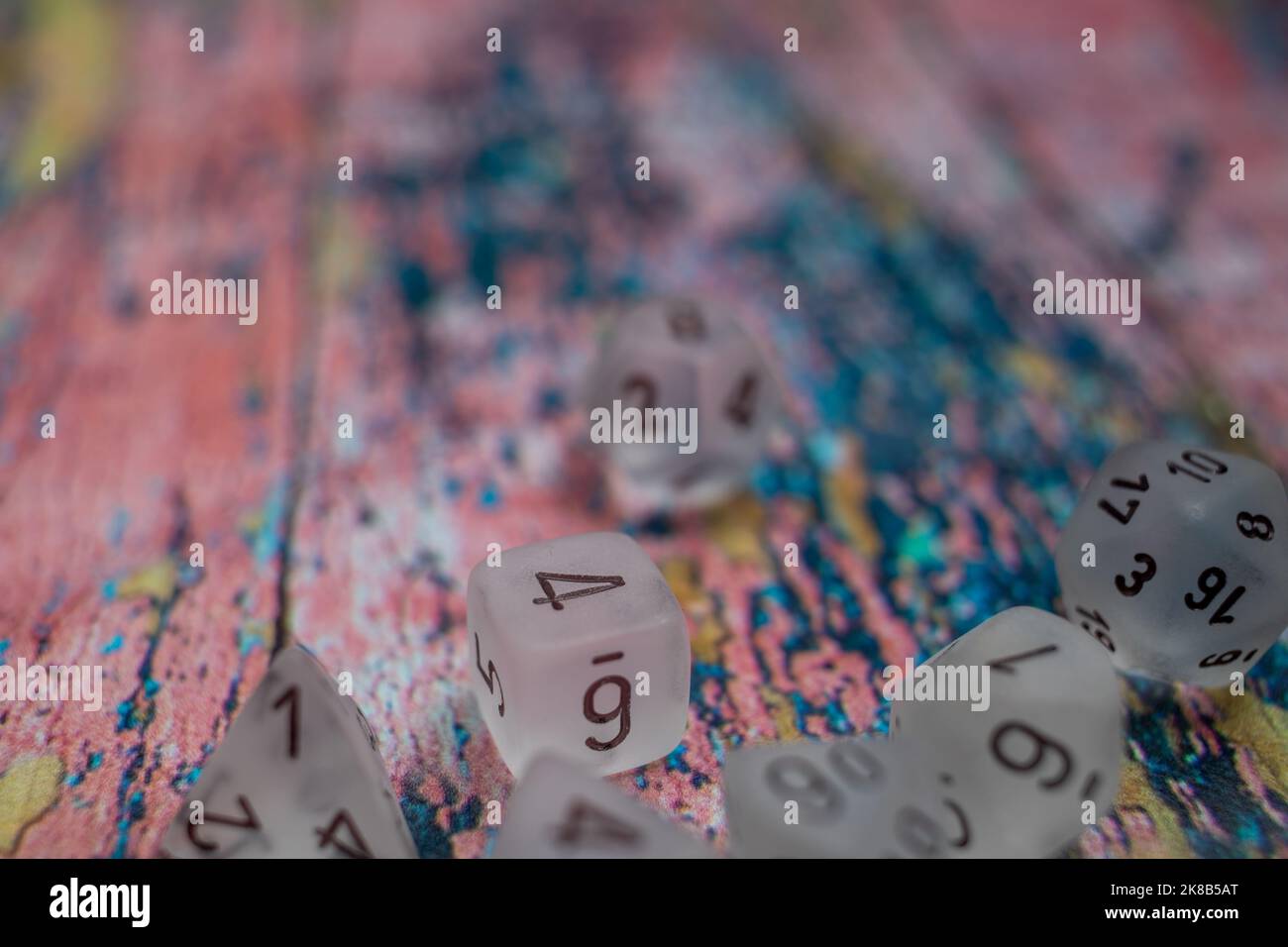 Dice On Colourfull Background Stock Photo