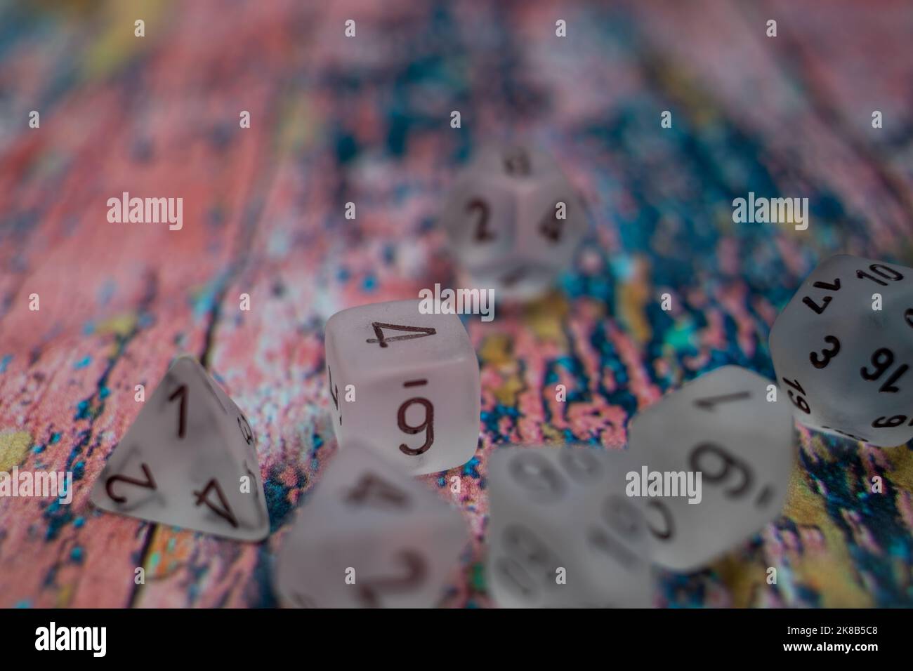 Dice On Colourfull Background Stock Photo