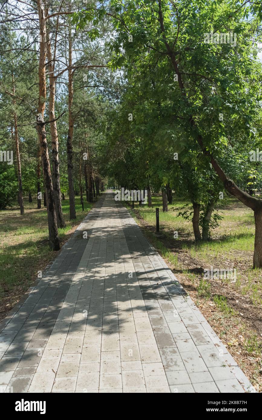 alley walk inside of square of M. Zhusup in Pavlodar Kazakhstan Stock Photo