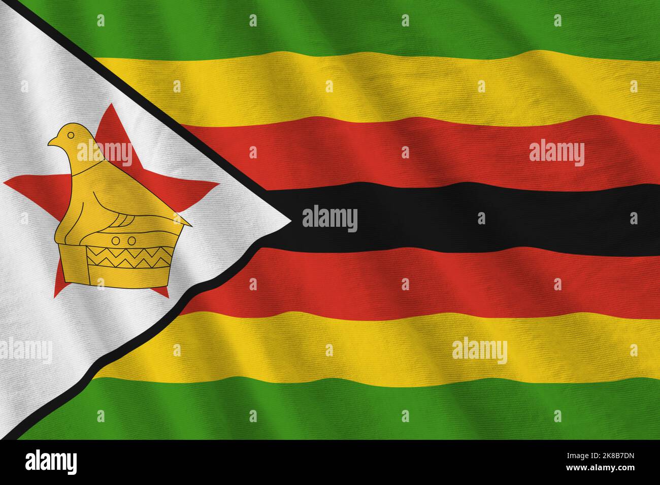 Zimbabwe Flag Reverse Zimbabwe flag with big folds waving close up under the studio light ...