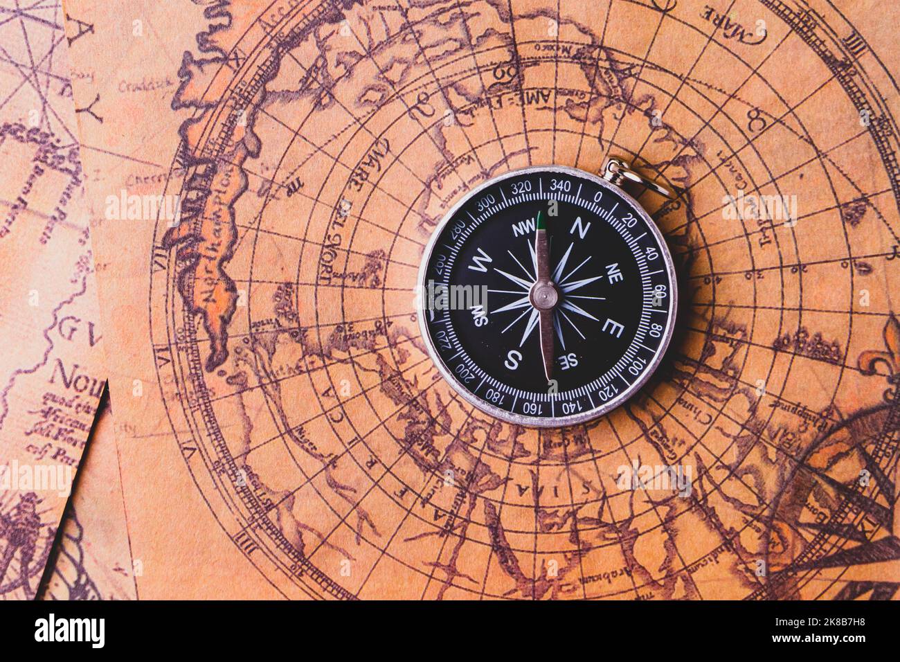 Looking for adventure. Compass and maps. Treasure map and path to the
