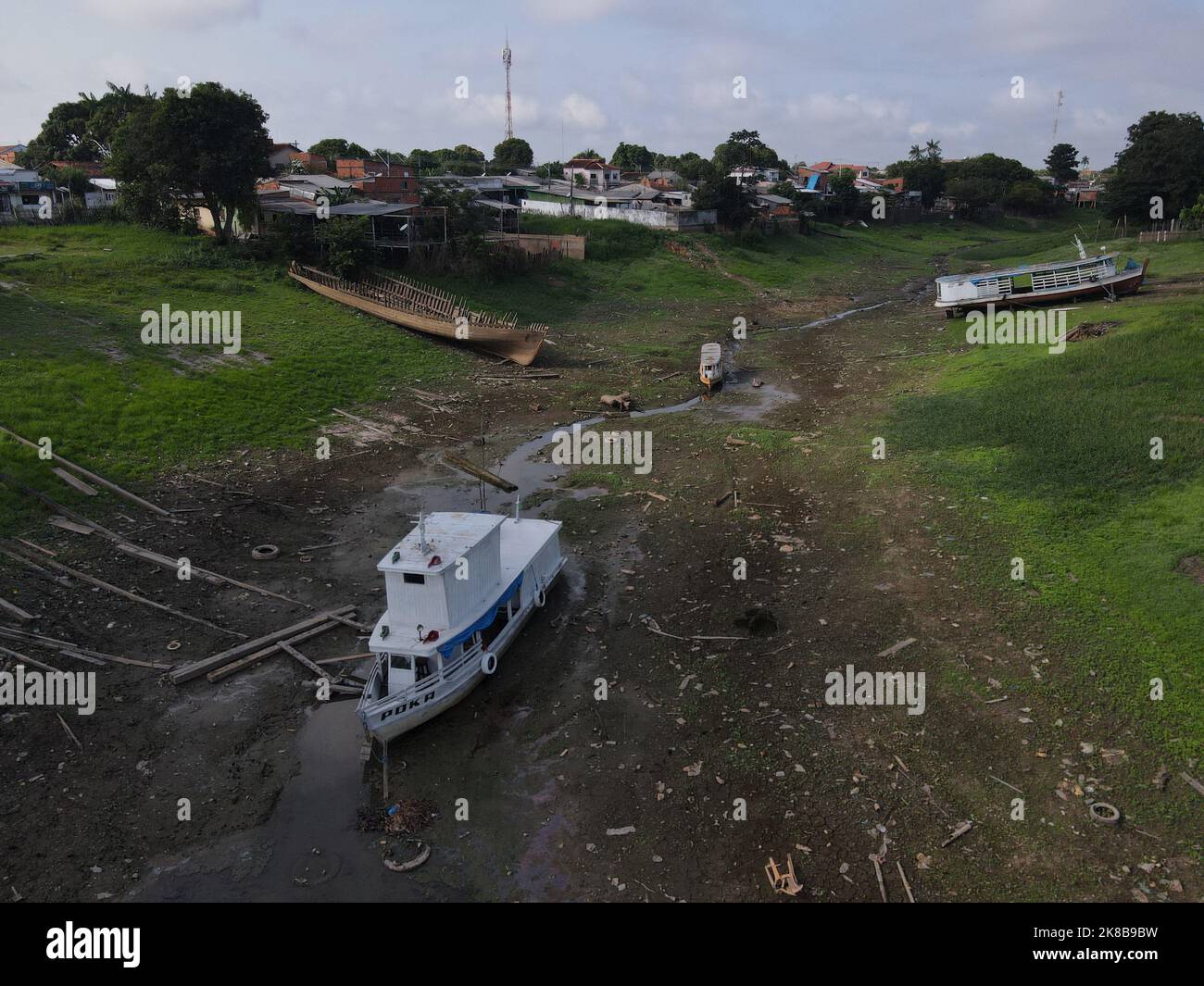 Boats are stranded by drought in Lagoa da Francesa, near the Amazonas River in Parintins, Brazil October 21, 2022. REUTERS/Bruno Kelly Stock Photo