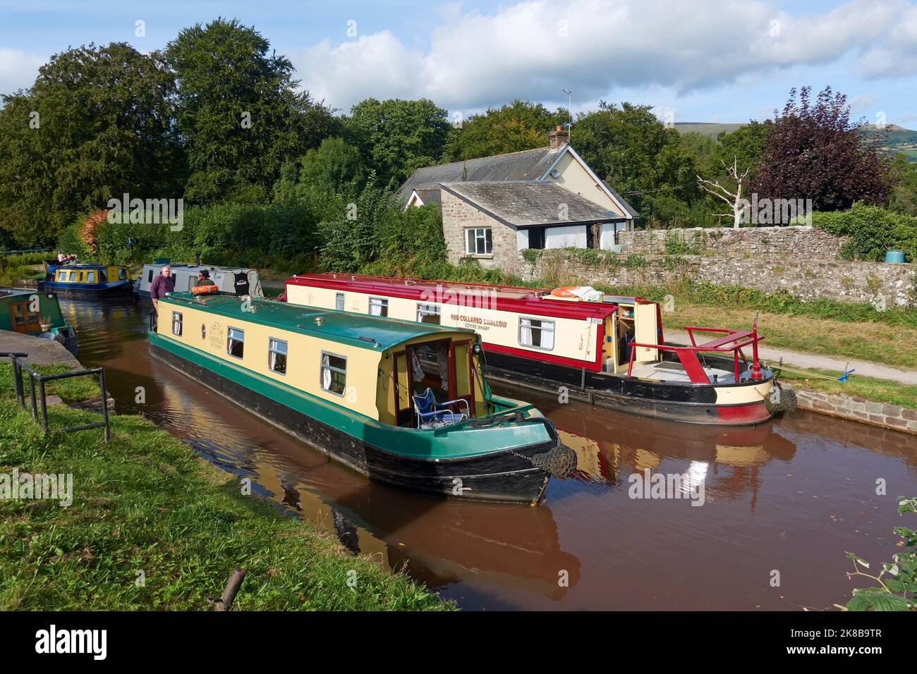 Narrowboats on the Monmouthshire and Brecon Canal at Llangattock, Powys, Wales. Stock Photo