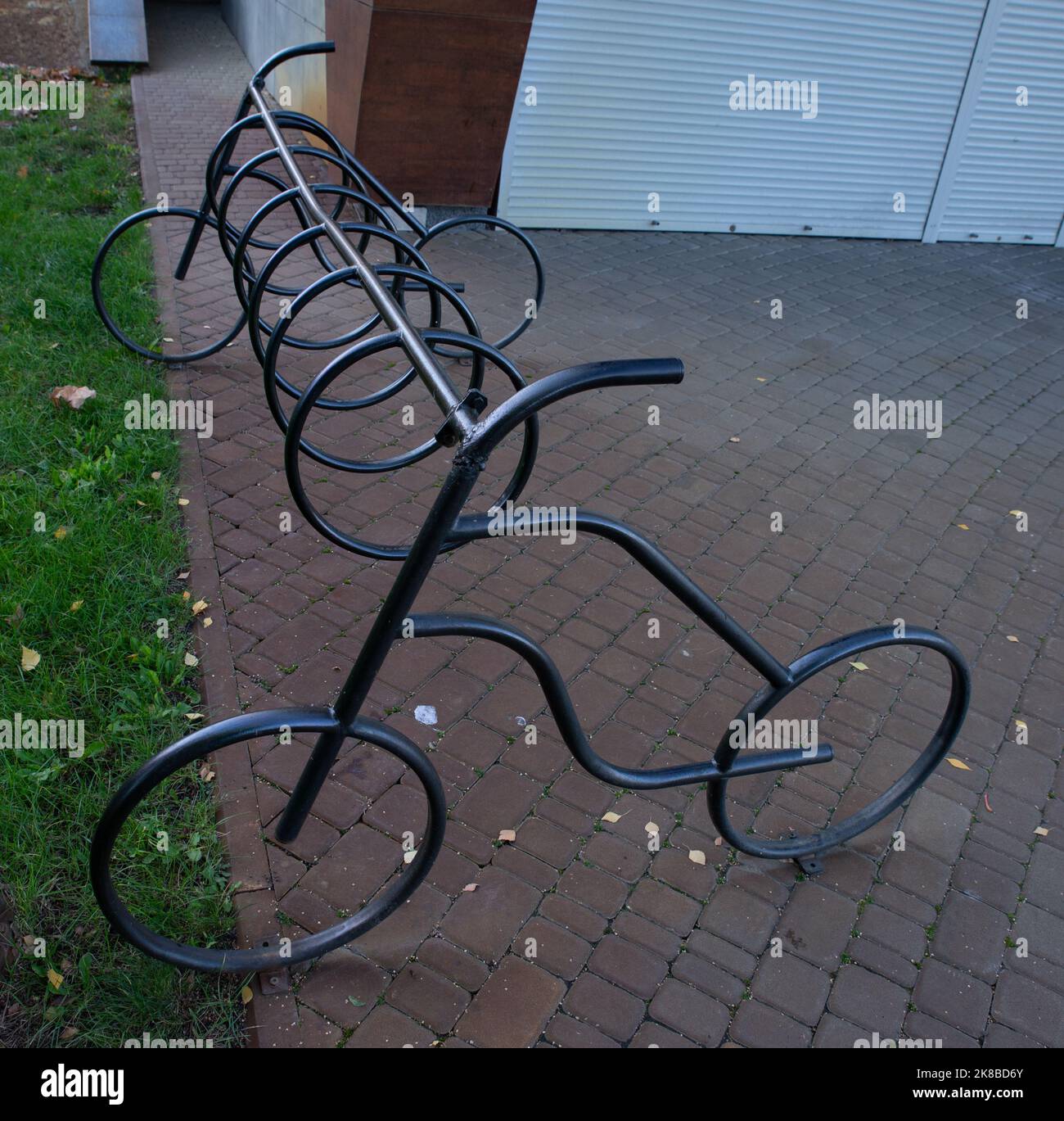 Empty bike parking. Parking space or spot for multiple bikes. place for Parking at the house or shop of bicycles or scooters, environmental transport Stock Photo