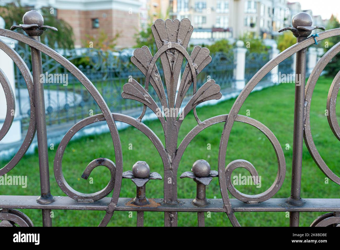 fence, wrought iron fence, and stone, wroughtiron ornaments