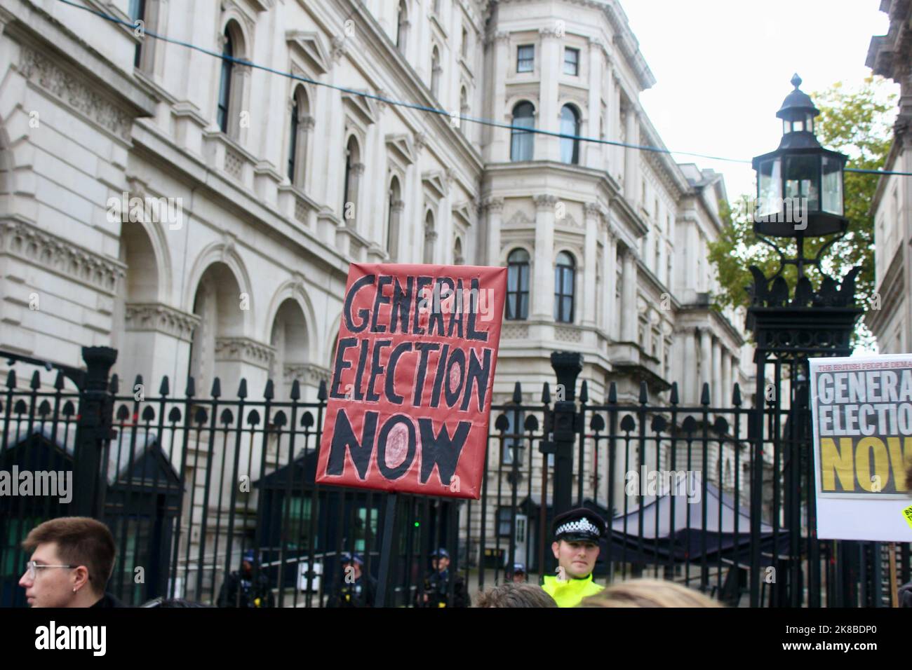 women holding signs saying general election now outside downing street on the first ever national rejoin the european union march in central london england UK 22nd october 2022 Stock Photo