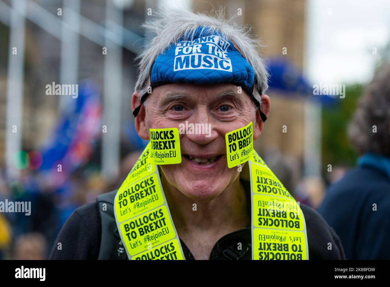 London, UK.  22 October 2022.  An EU supporter with topical stickers takes part in the first National Rejoin March from Park Lane to Parliament Square.  Participants want the UK to rejoin the European Union claiming that Brexit is a negative impact on the economy and has contributed to the ongoing cost of living crisis.  Credit: Stephen Chung / Alamy Live News Stock Photo