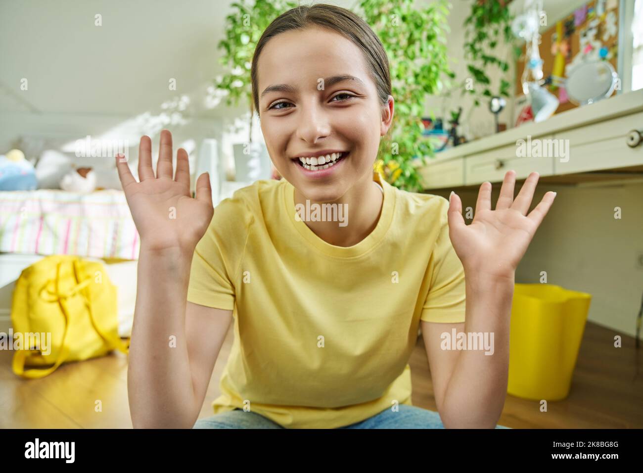 Adolescent teenage girl student having video call, looking at webcam Stock  Photo - Alamy