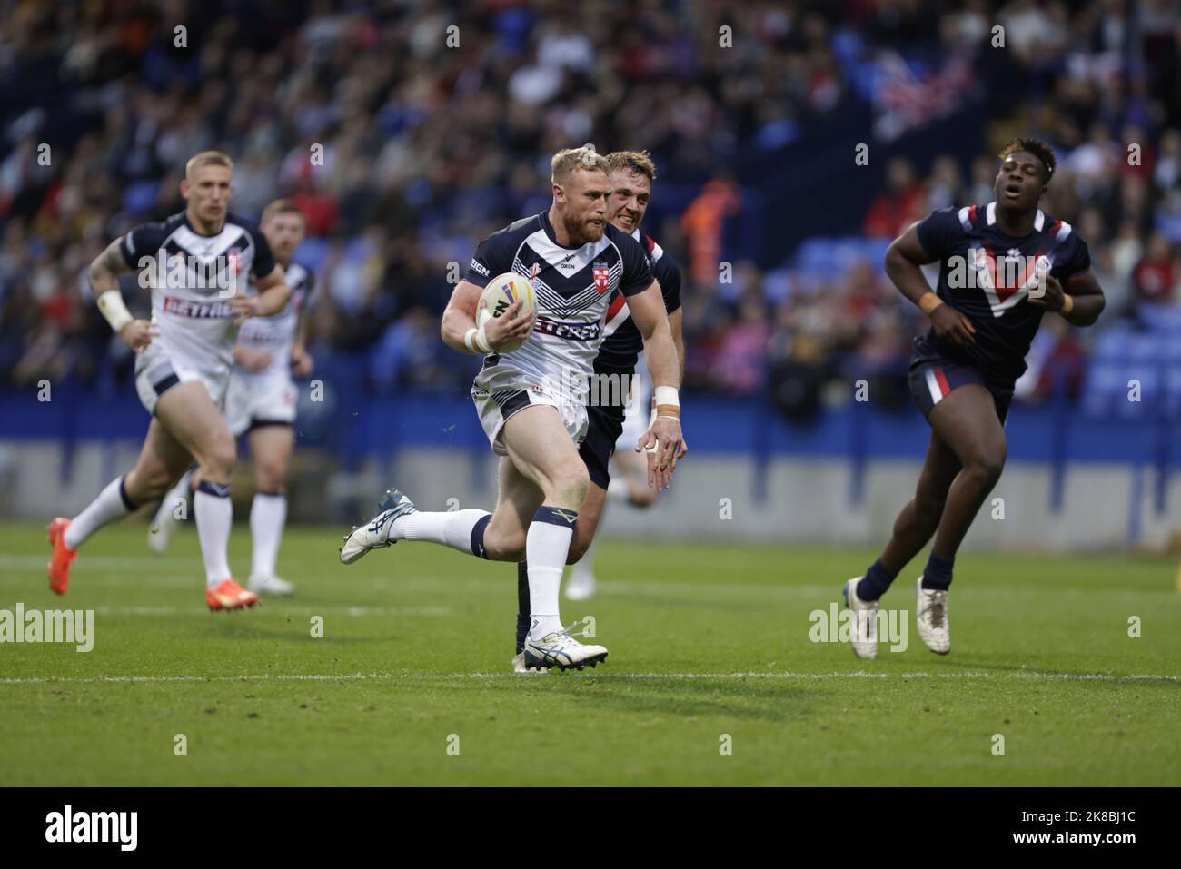 England's Luke Thompson runs in to score his sides third try of the