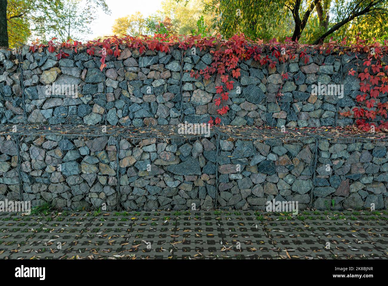 a modern urban park environmental object development, gabion fence wall ...