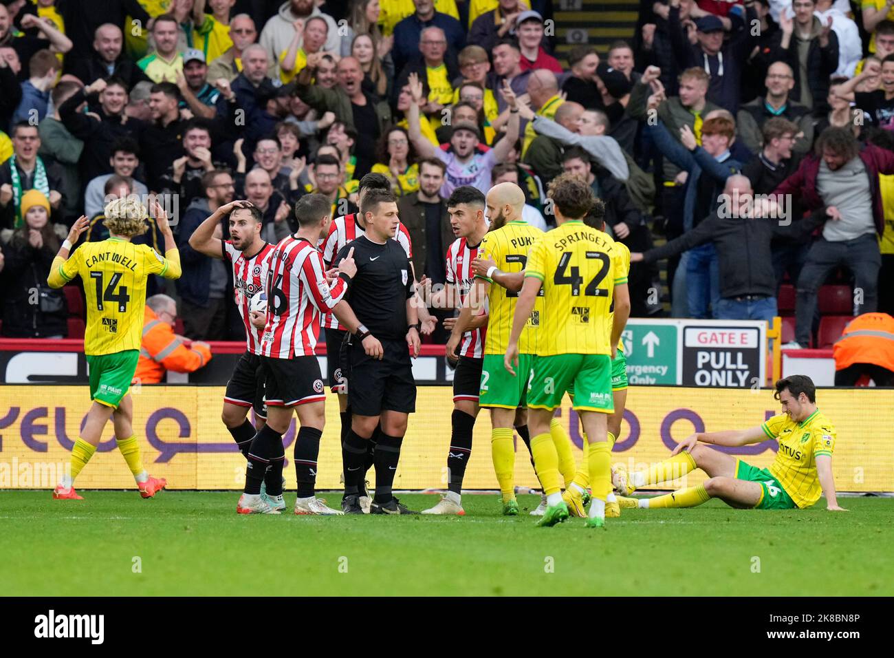 Sheffield United players react after Referee Josh Smith awards a penalty to Norwich during the Sky Bet Championship match Sheffield United vs Norwich City at Bramall Lane, Sheffield, United Kingdom, 22nd October 2022  (Photo by Steve Flynn/News Images) Stock Photo