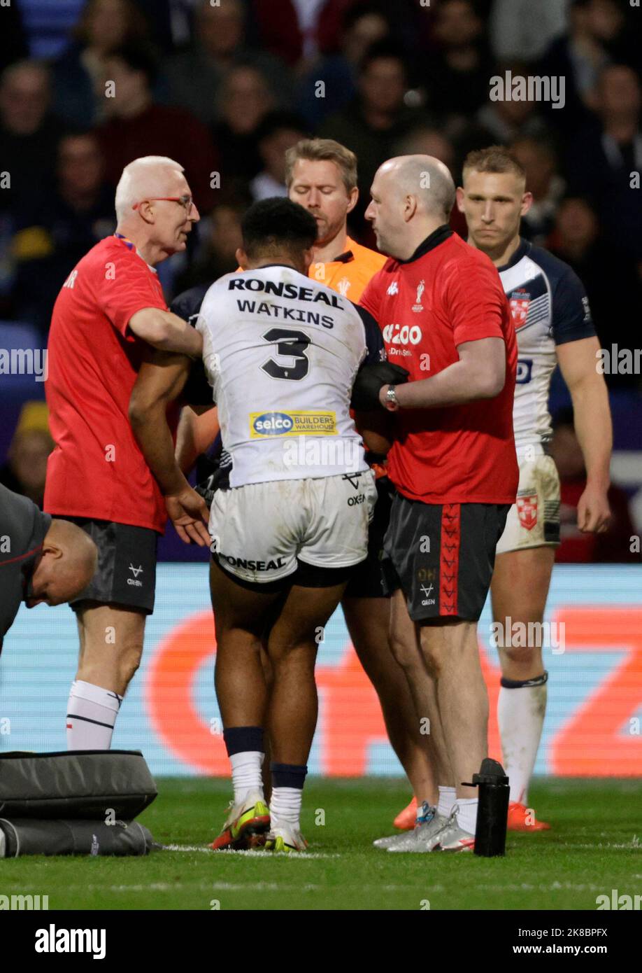 England's Kallum Watkins is helped to his feet after suffering a head
