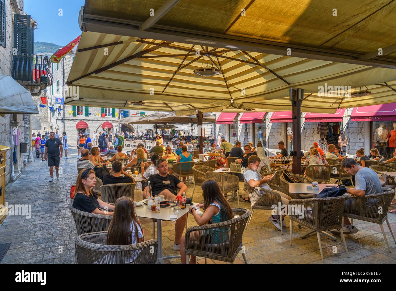 Cafe / restaurant in the old town, Square of the Arms, (Trg od Oružja) Kotor, Montenegro Stock Photo