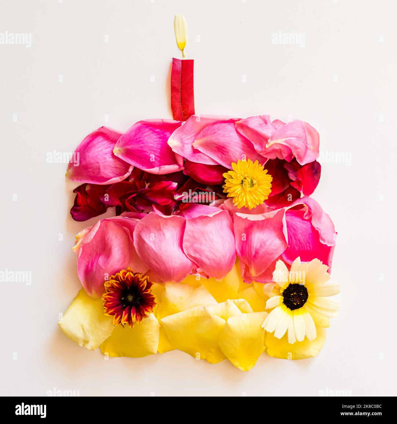 happy birthday cake made from rose petals and leaves Stock Photo