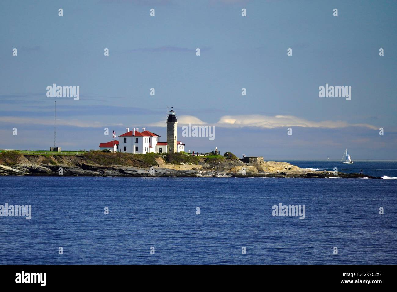 Beavertail Lighthouse as seen from Narragansett Bay in Rhode Island Stock Photo