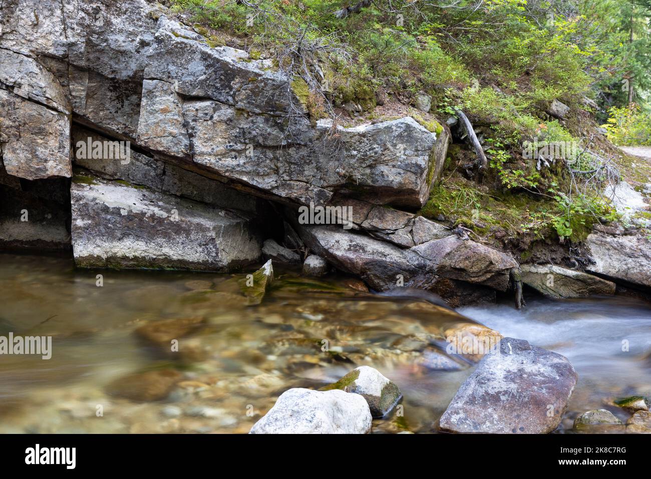 Rocks and boulders lining the South Fork of Cascade Creek. Grand Teton National Park, Wyoming Stock Photo